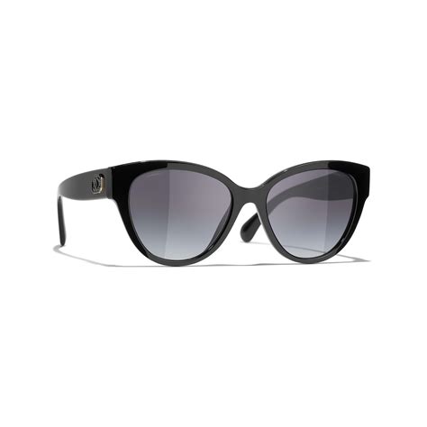 chanel butterfly subglasses|Chanel butterfly sunglasses with chain.